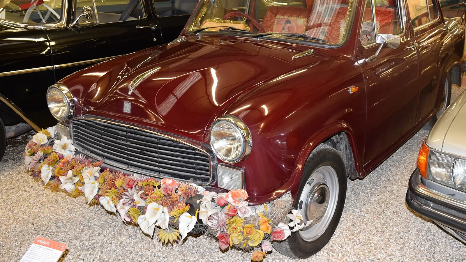 Maroon 1992 Hindustan Ambassador on display in a car museum